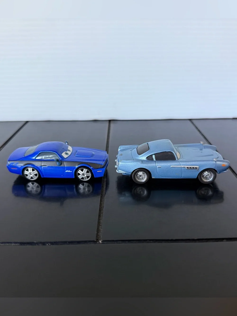 Disney Pixar Cars 2 Rod Torque Redline and Finn McMissile 1:55 diecast